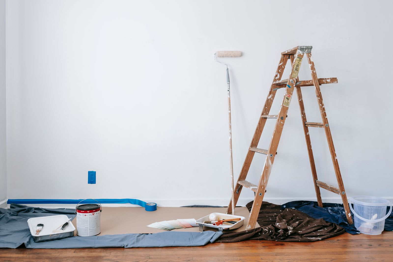 Containment sheeting and protected floors mid-renovation